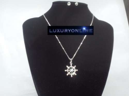 CAPTIVATING! Ship's Helm And Earring Set With 24 0.75 Carat Simulated Diamonds