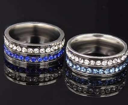 RETAIL PRICE: R 1 499 Titanium 8 mm  Ring With Simulated Light Blue & White Diamonds  Size  9 US