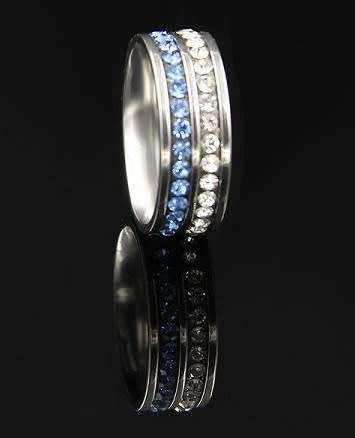 RETAIL PRICE: R 1 499 Titanium 8 mm  Ring With Simulated Light Blue & White Diamonds  Size  9 US