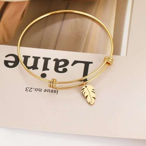 RETAIL PRICE: R 999 Adjustable Titanium Whimsical Feather Bracelet (GOLD OR SILVER)