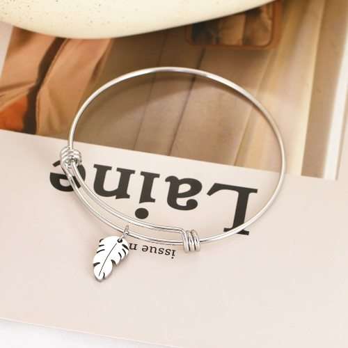 RETAIL PRICE: R 999 Adjustable Titanium Whimsical Feather Bracelet (GOLD OR SILVER)