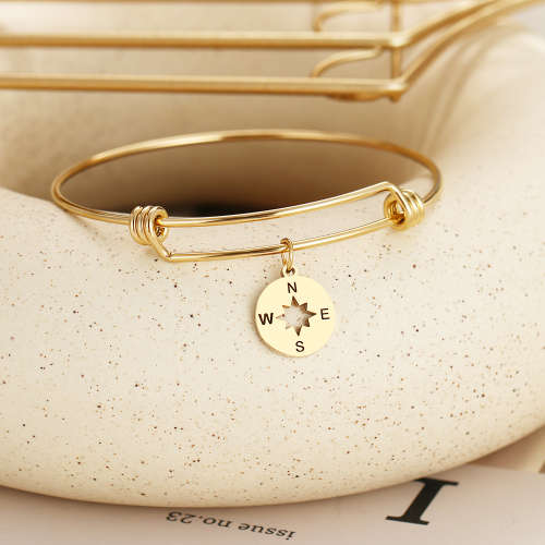 RETAIL PRICE: R 999 Adjustable Titanium "Nautical" Charm Bangle (GOLD )