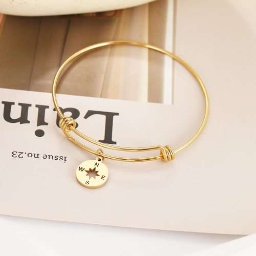 RETAIL PRICE: R 999 Adjustable Titanium "Nautical" Charm Bangle (GOLD )