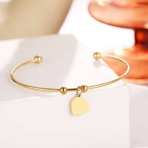 RETAIL PRICE: R 999 Adjustable Titanium "Heart" Charm Bangle (SILVER)