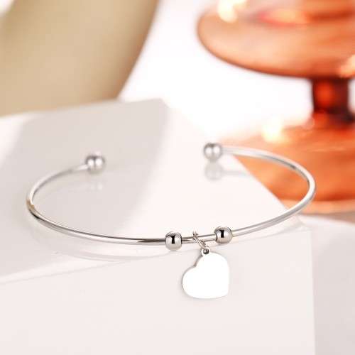 RETAIL PRICE: R 999 Adjustable Titanium "Heart" Charm Bangle (SILVER)