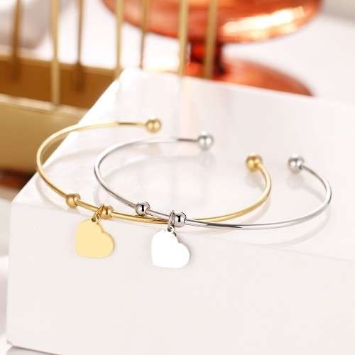 RETAIL PRICE: R 999 Adjustable Titanium "Heart" Charm Bangle (SILVER)