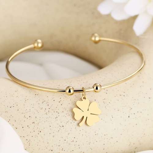 RETAIL PRICE: R 1299 Adjustable Titanium (NEVER FADE) "Clover" Charm Bangle (GOLD )