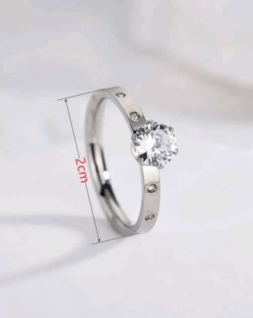 SILVER RING WITH SUMILATED DIAMONDS SIZE 7 US