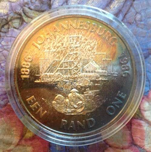 RSA Proof 1986 Johannesburg Centenary Silver One Rand in capsule