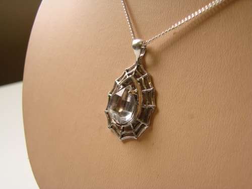 BEAUTIFUL HAND CRAFTED LADIES WEB PENDANT IN .925 STERLING SILVER FITTED WITH A HERKIMAR DIAMOND