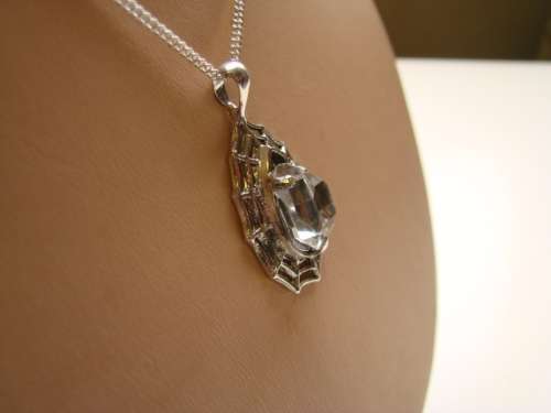 BEAUTIFUL HAND CRAFTED LADIES WEB PENDANT IN .925 STERLING SILVER FITTED WITH A HERKIMAR DIAMOND