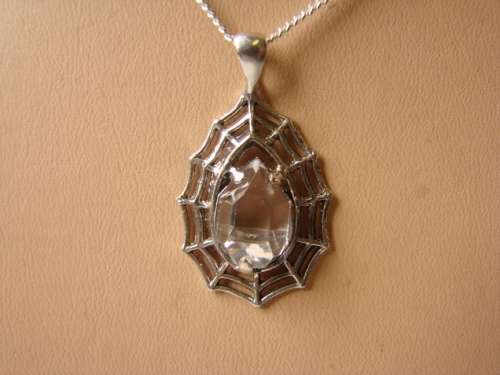 BEAUTIFUL HAND CRAFTED LADIES WEB PENDANT IN .925 STERLING SILVER FITTED WITH A HERKIMAR DIAMOND