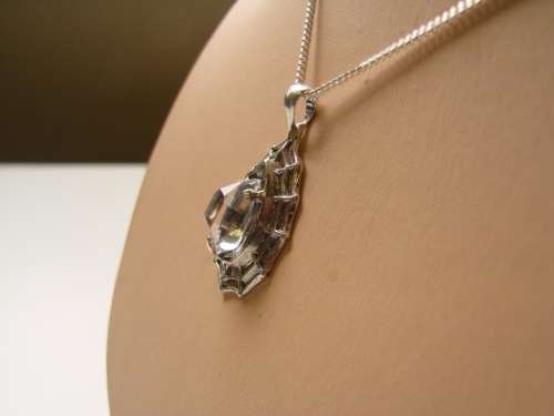 BEAUTIFUL HAND CRAFTED LADIES WEB PENDANT IN .925 STERLING SILVER FITTED WITH A HERKIMAR DIAMOND
