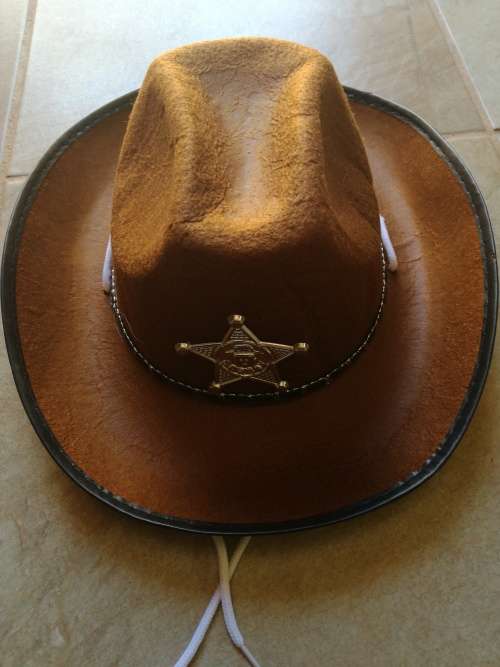 Kids dress up cowboy hat with badge and white cord was R40 now R25