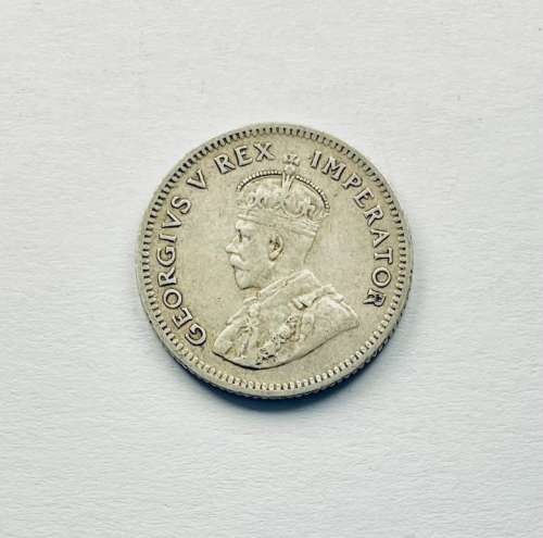 1936, Sixpence