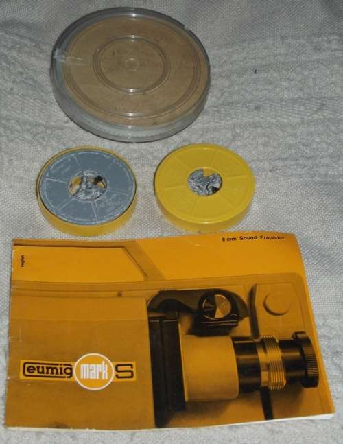 8mm Projector with films and splicer and editor