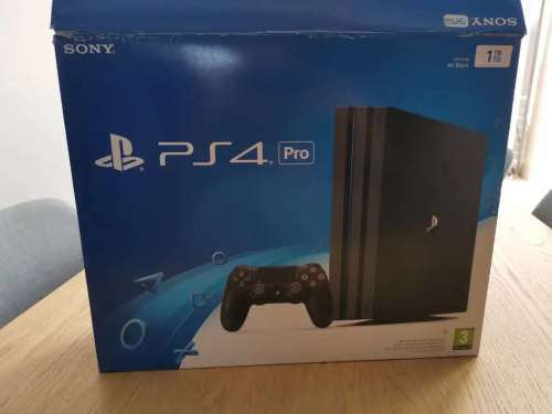 Playstation 4 pro (Ps4 pro) with 5 games.