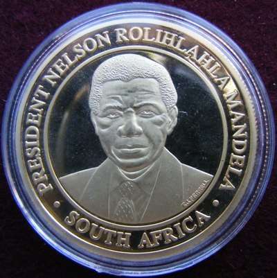 Mandela  '"The victory of democracy over apartheid" commemorative medallion. Large gold plated