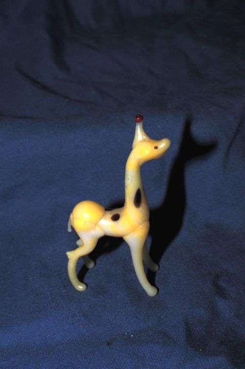 15 FINE COLOURED GLASS ORNAMENTS