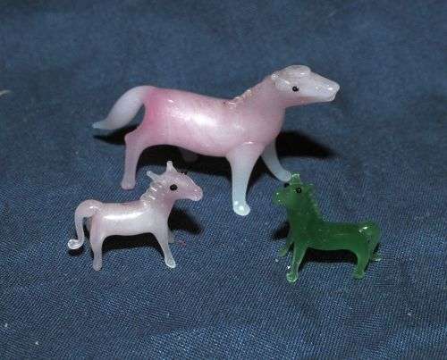 15 FINE COLOURED GLASS ORNAMENTS