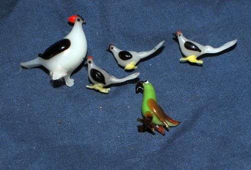 15 FINE COLOURED GLASS ORNAMENTS