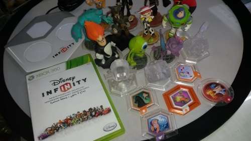 Disney Infinity game, base, 5 power disks,  3 trophy's and 11 characters