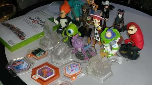 Disney Infinity game, base, 5 power disks,  3 trophy's and 11 characters