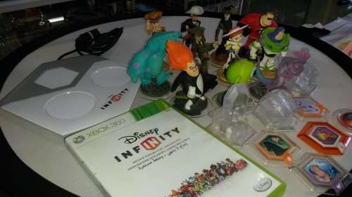 Disney Infinity game, base, 5 power disks,  3 trophy's and 11 characters