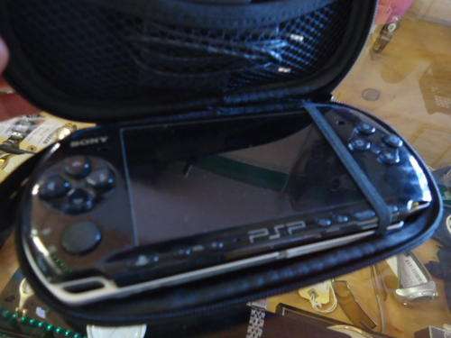 Black PSP in case with Charger