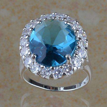 FIRE BLUE TOPAZ RING SIZE 8.5