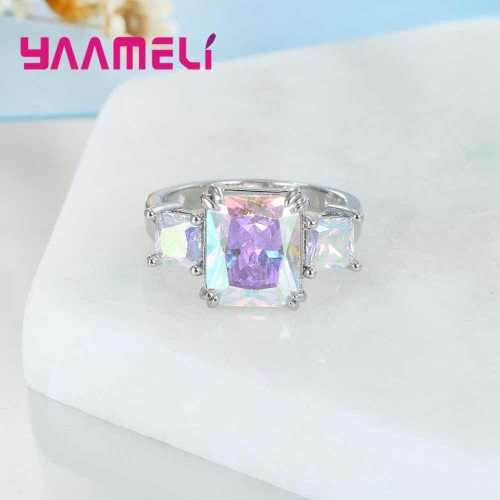 THREE MAGNIFICENT CUBIC ZIRCONIA STONES SILVER RING