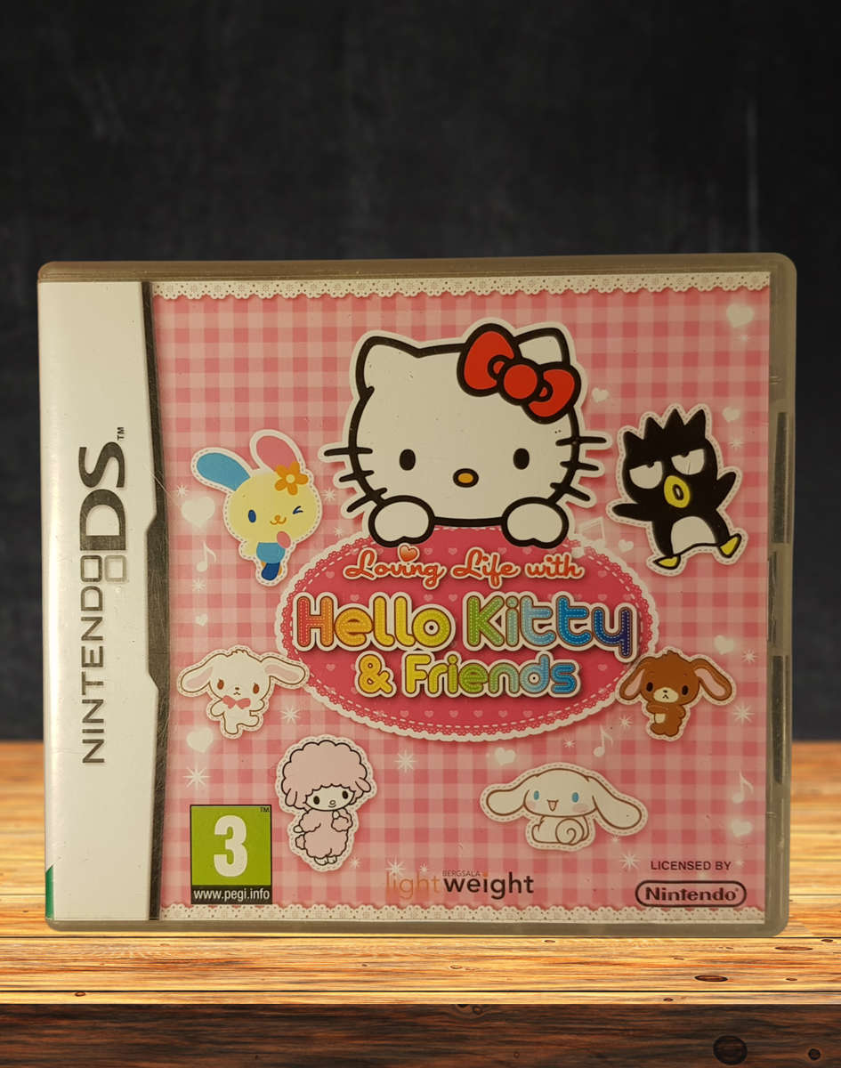 Nintendo DS Lite Coral Pink in Hello Kitty Case in Hello Kitty Case and 3 Games - Great Condition