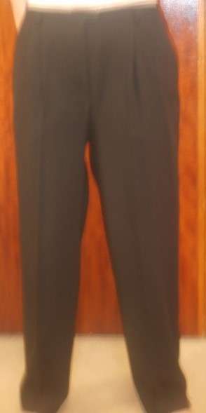 MArks & Spencer black pants. One plead and side pockets. Waist 103 cm