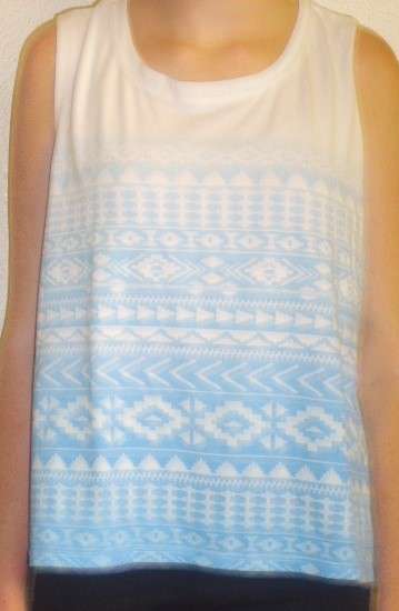 SLEEVELESS OVERSIZE T.  SIZE L. AS NEW