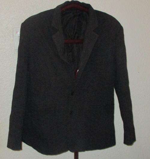 BLACK STRETCH JACKET.UZZI. SIZE LARGE. CONDITION VERY GOOD