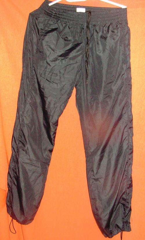 BLACK TRACK PANTS. MAXED. SIZE MEDIUM. CONDITION: AS NEW