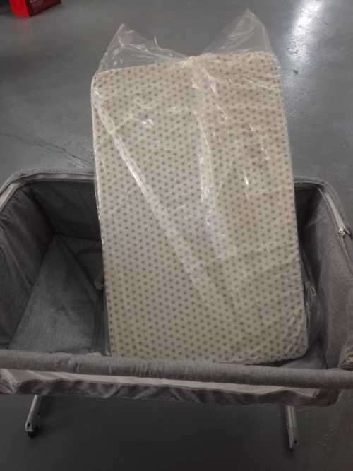 Gray and White Baby Bassinet