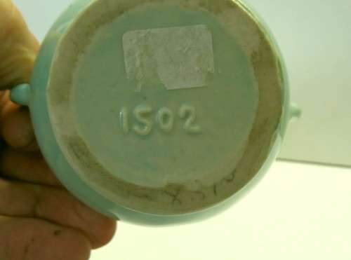 Lucia Ware candle holders and Toby