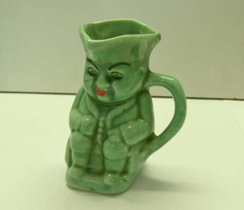 Lucia Ware candle holders and Toby