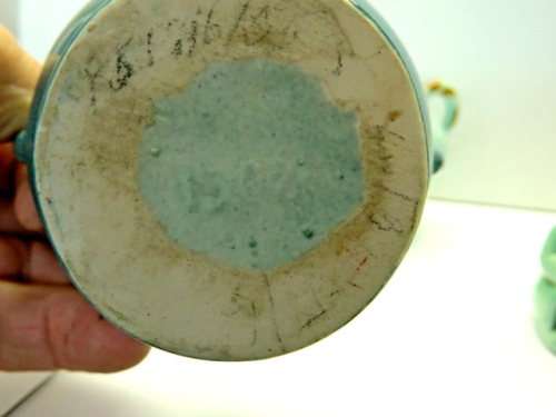 Lucia Ware candle holders and Toby