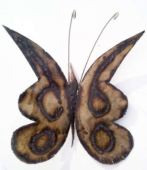 Metal Garden Ornament.  Butterfly Patterned Wings.