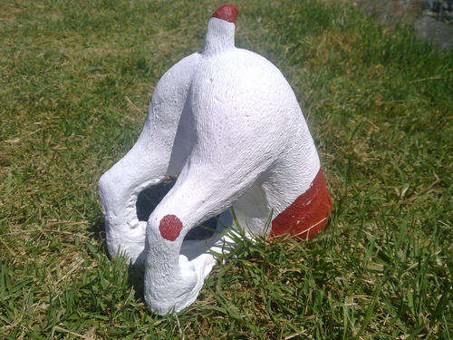 Cement Garden Ornament Digging Dog. Brown and White.