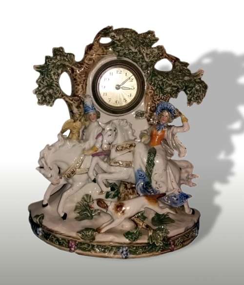 LOT 63: GERMAN PORCELAIN FIGURAL CLOCK FALCONRY THEME