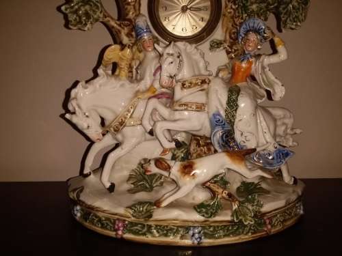 LOT 63: GERMAN PORCELAIN FIGURAL CLOCK FALCONRY THEME