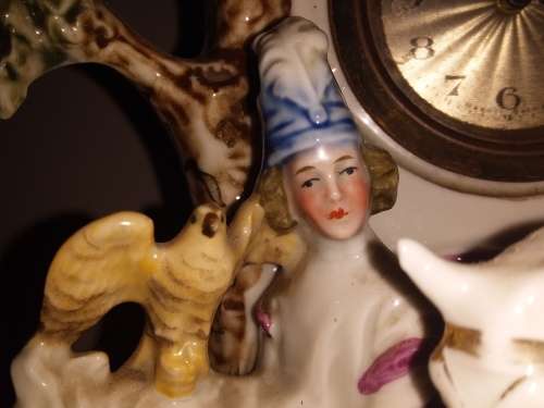 LOT 63: GERMAN PORCELAIN FIGURAL CLOCK FALCONRY THEME