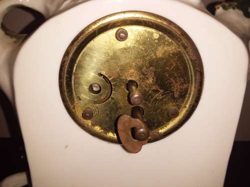 LOT 63: GERMAN PORCELAIN FIGURAL CLOCK FALCONRY THEME