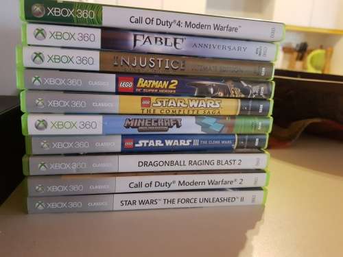 Almost brand new xbox 360 with 2 controllers and 10 games