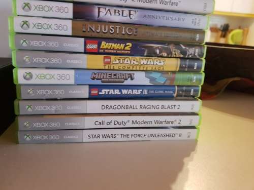 Almost brand new xbox 360 with 2 controllers and 10 games