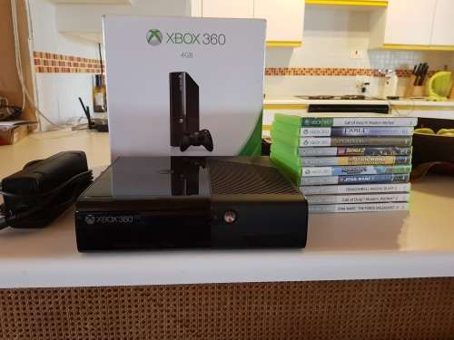 Almost brand new xbox 360 with 2 controllers and 10 games