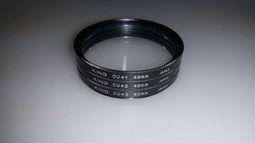 Various 49mm set. Hoods, filters, step-up, cap. - Late listing!